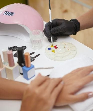 painting-nails-during-professional-manicure-sessio-2025-02-11-14-04-33-utc