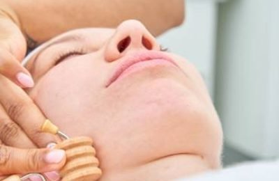 beautician-performing-a-facial-wood-therapy-treatm-2025-01-16-02-54-51-utc