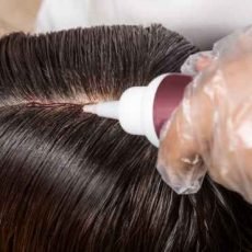 hair-dresser-applying-chemical-hair-color-dye-onto-2025-03-10-01-04-58-utc