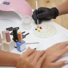 painting-nails-during-professional-manicure-sessio-2025-02-11-14-04-33-utc